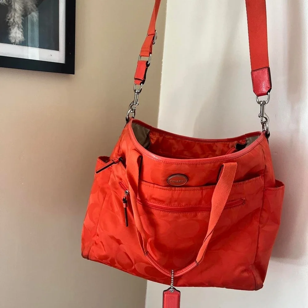 Coach orange metal cs